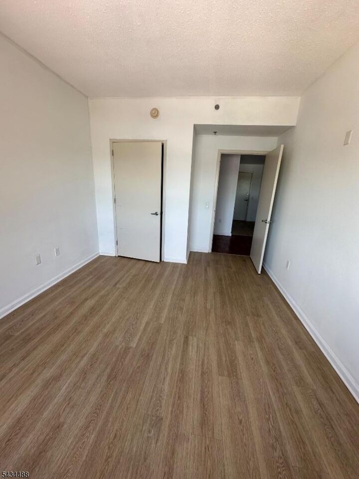 Property Photo:  1 Carriage City Plz 1203  NJ 07065 