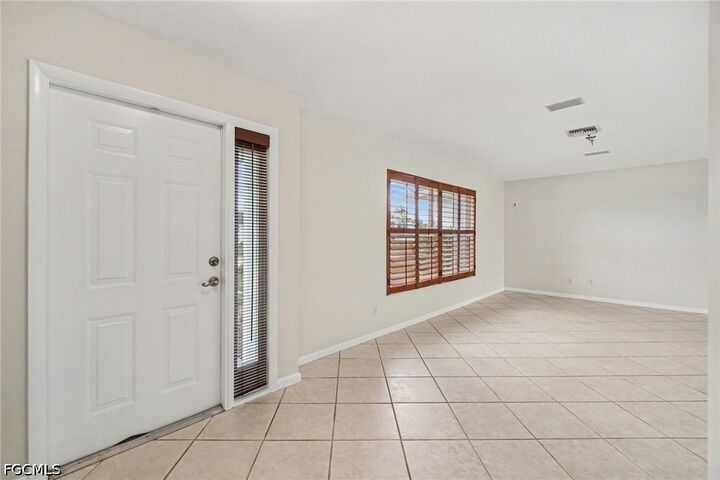 Property Photo:  4437 SE 10th Avenue  FL 33904 