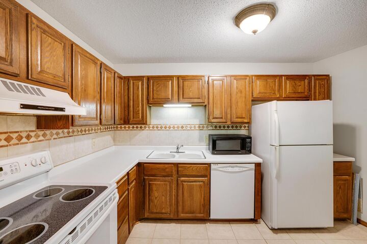 Property Photo: 10441 Greenbrier Road 311 MN 55305