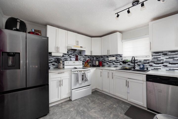 Property Photo: 236 Grenfell Crescent AB T9H 2M6