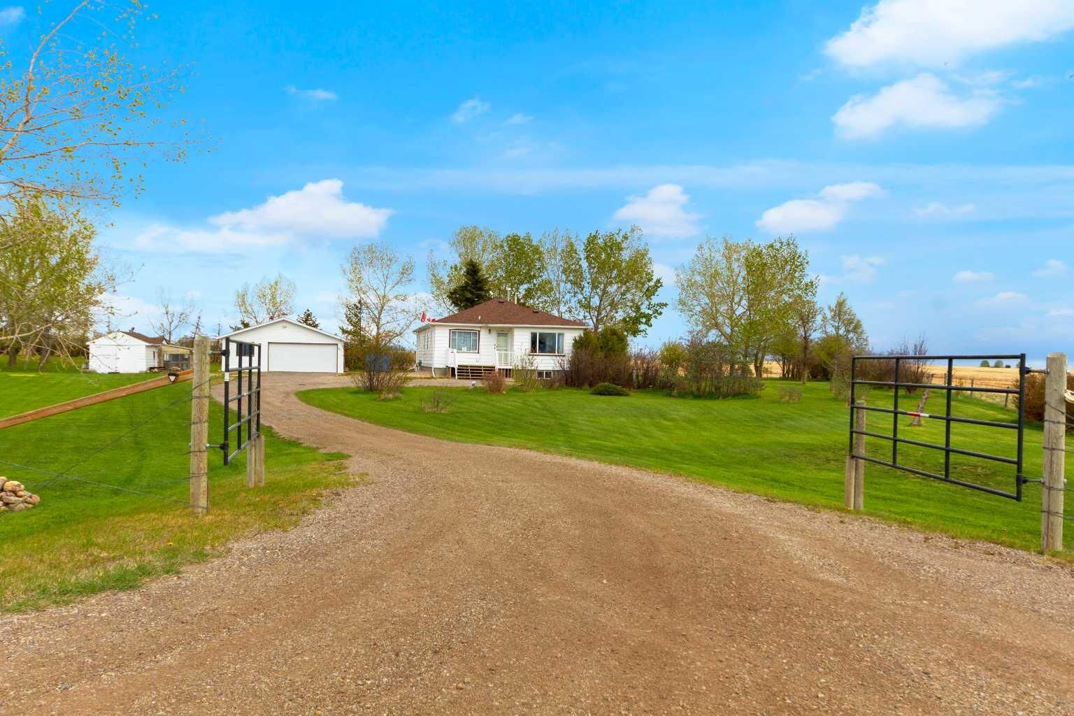 Property Photo:  241043 Range Road 270  AB T1P 0S2 