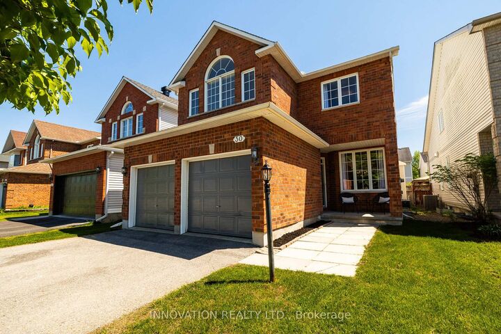 Property Photo: 30 Mountain Ash Drive ON K2G 6R3