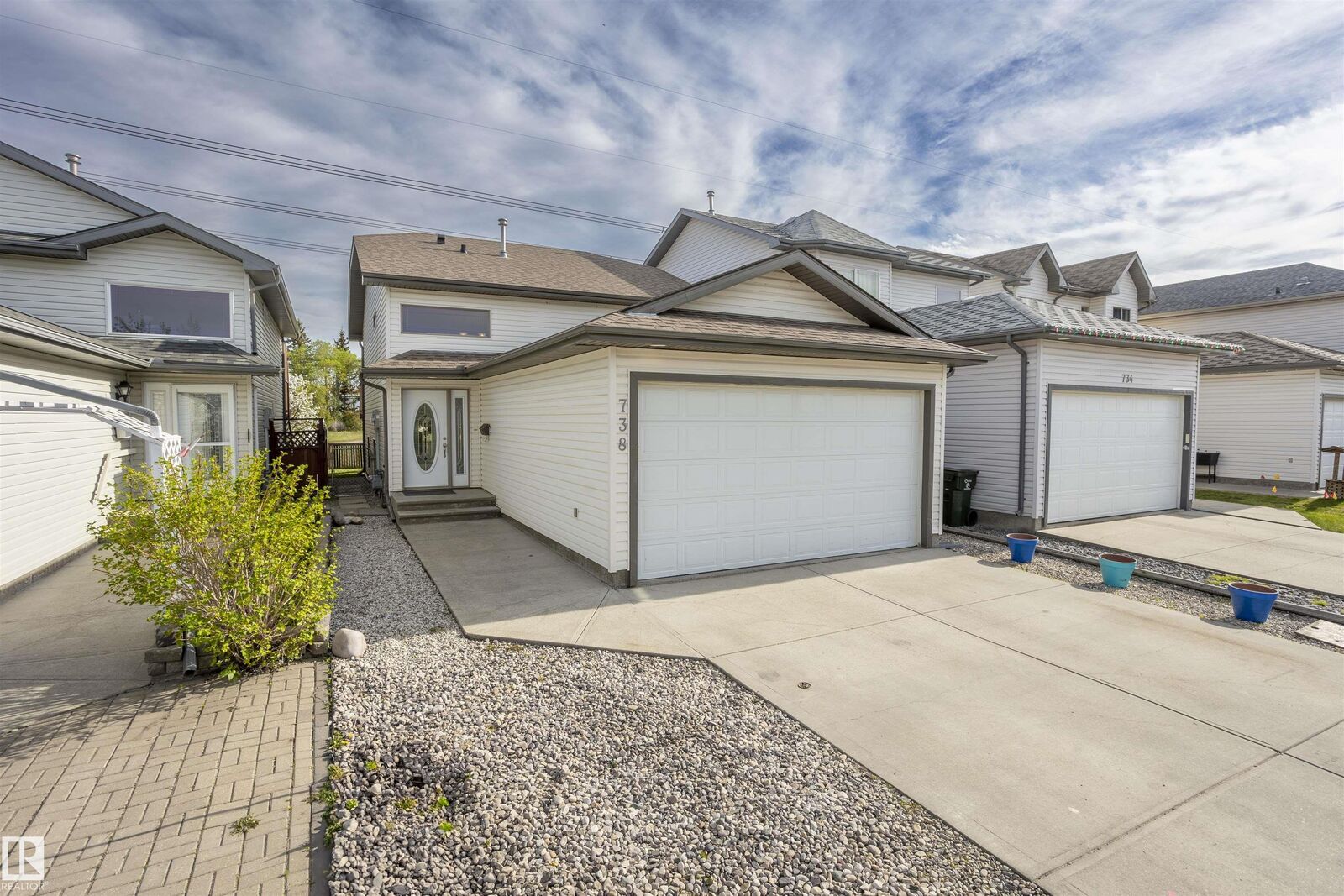 Property Photo:  738 Kananaskis Drive  AB T9G 2G7 