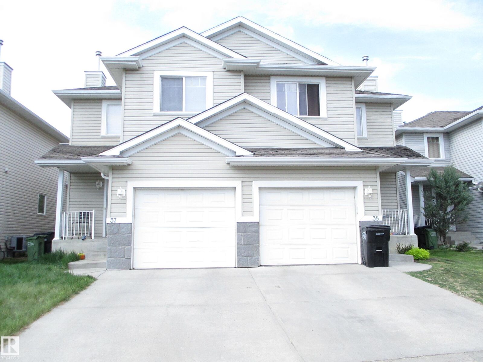 Property Photo: 287 Macewan Road SW 37 AB T6W 1T4