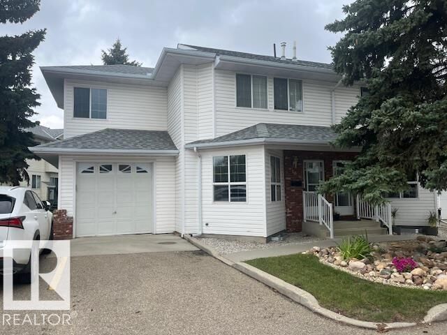 1033 Youville Dr. West NW NW — photo 1