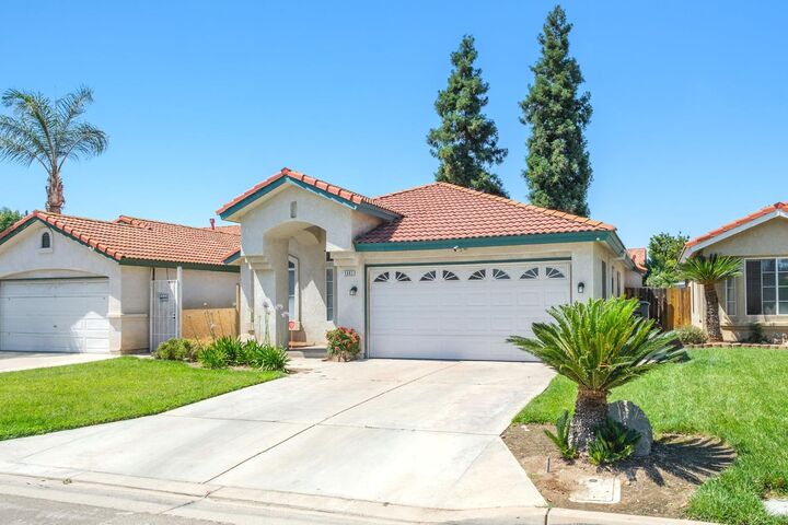 Property Photo:  5682 W Sample Avenue  CA 93722 