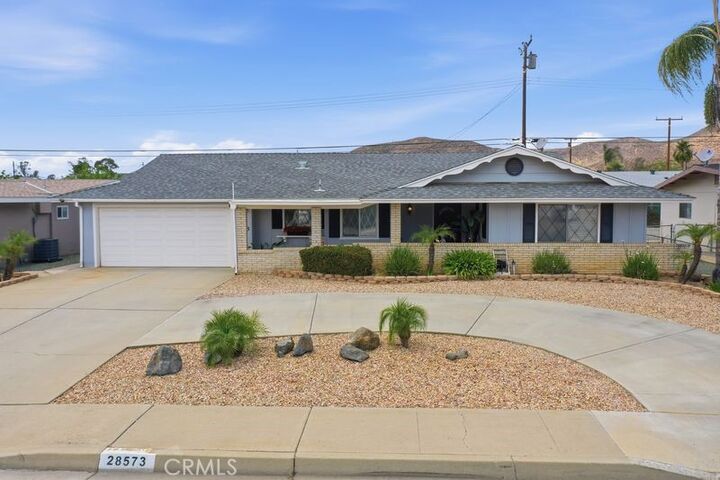 Property Photo:  28573 Murrieta Road  CA 92586 