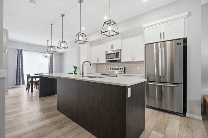 Property Photo:  11186 Harvest Hills Gate NE  AB T3K 2M7 
