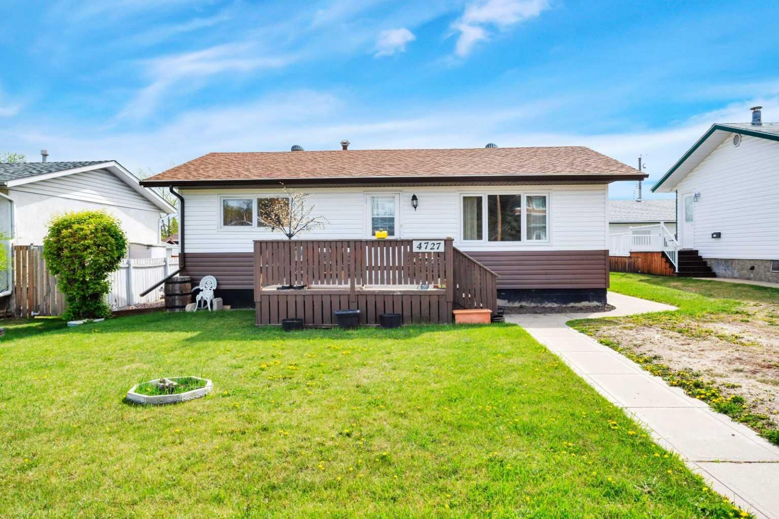 Property Photo: 4727 48 Street AB T4S 1M9