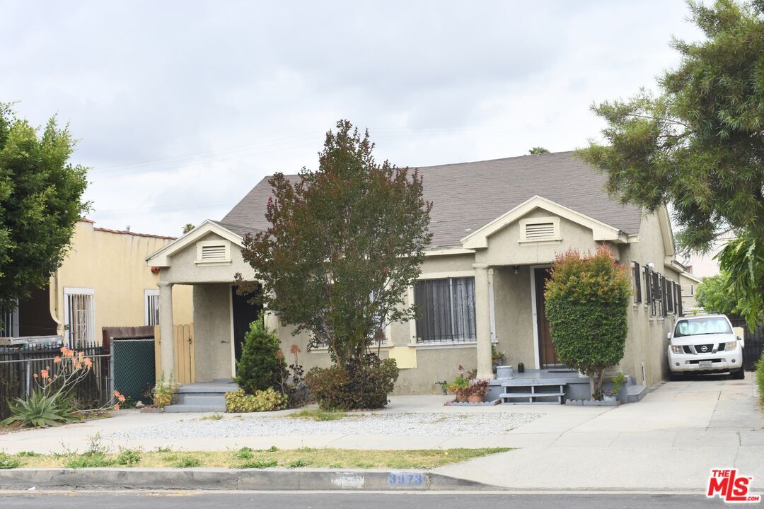 Property Photo:  3973 S Van Ness Ave  CA 90062 