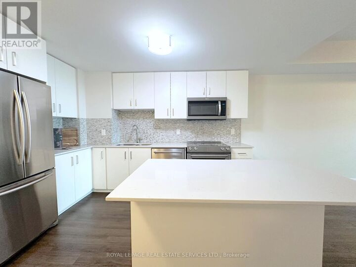 Property Photo: 2333 Taunton Road 101 ON L6H 0N5