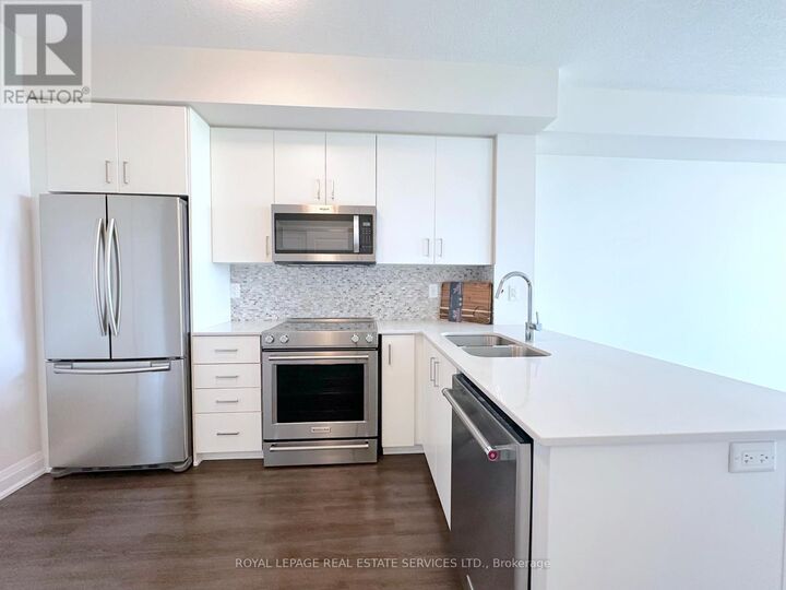 Property Photo:  2333 Taunton Road 407  ON L6H 0N5 