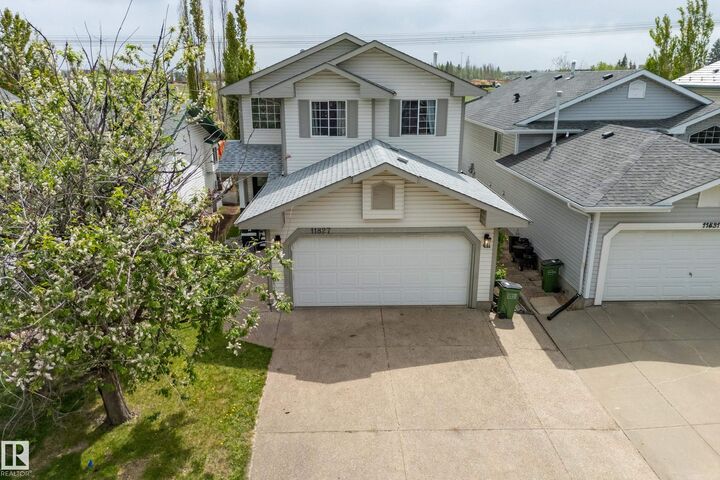Property Photo: 11827 8 Avenue NW AB T6J 6Z9