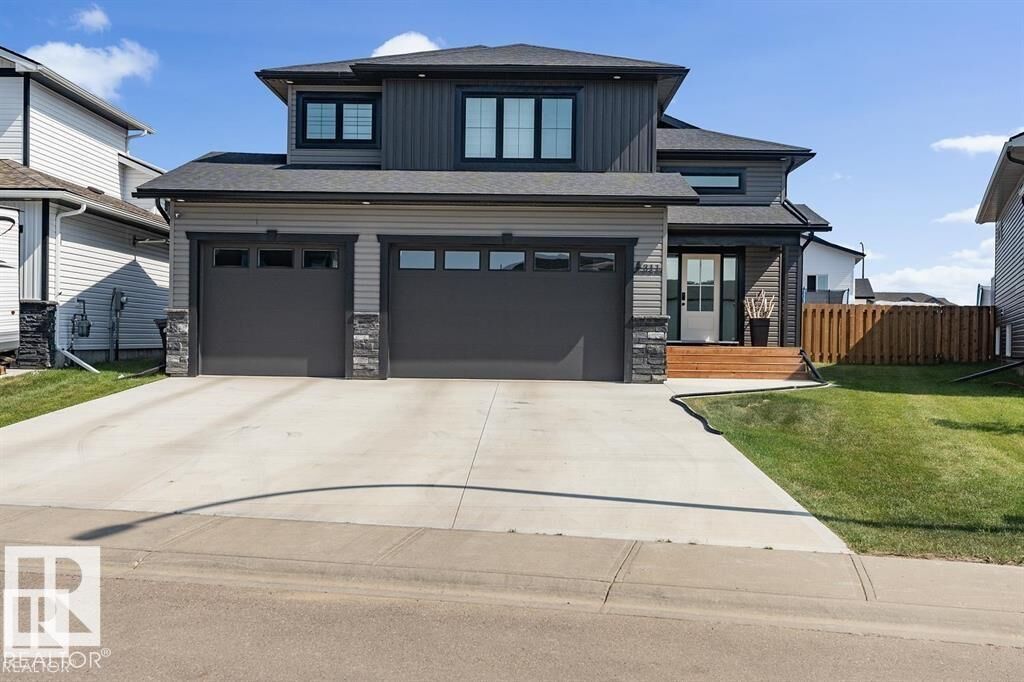 Property Photo:  303 Fundy Way  AB T9M 0M4 