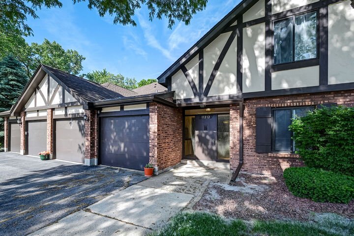 Property Photo: 11212 Cottonwood Drive 23B IL 60465
