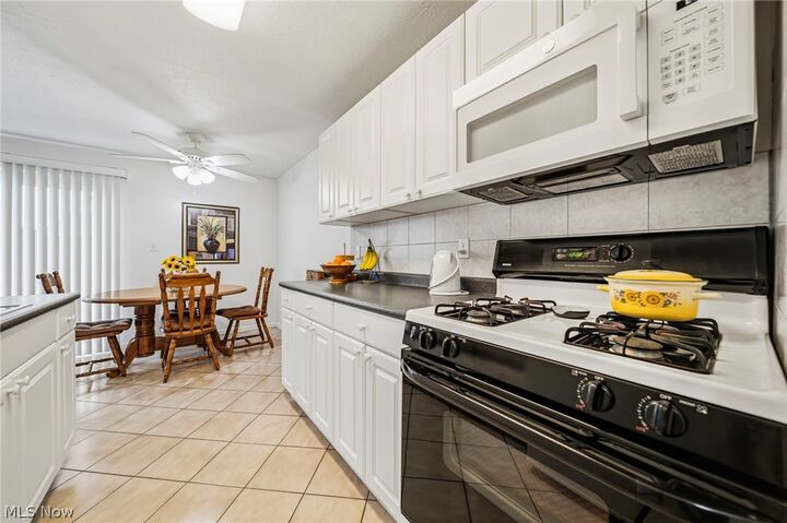 Property Photo:  1408 Golden Gate Boulevard 203  OH 44124 
