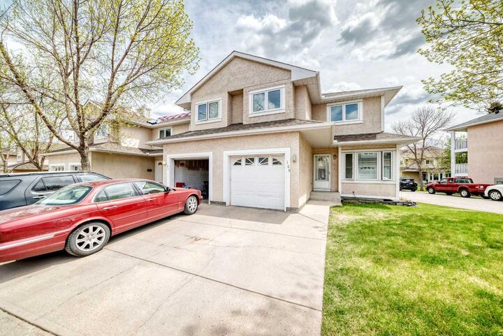 Property Photo: 388 Sandarac Drive NW 109 AB T3K 4E3