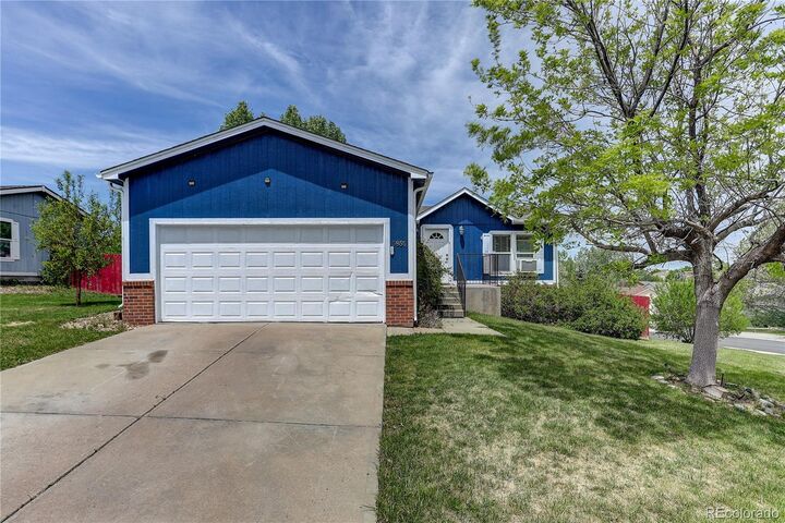 Property Photo:  5853 S Quemoy  CO 80015 