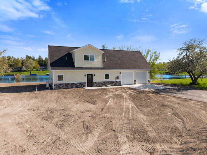 Property Photo:  1126 Waters Edge Drive  MI 49721 