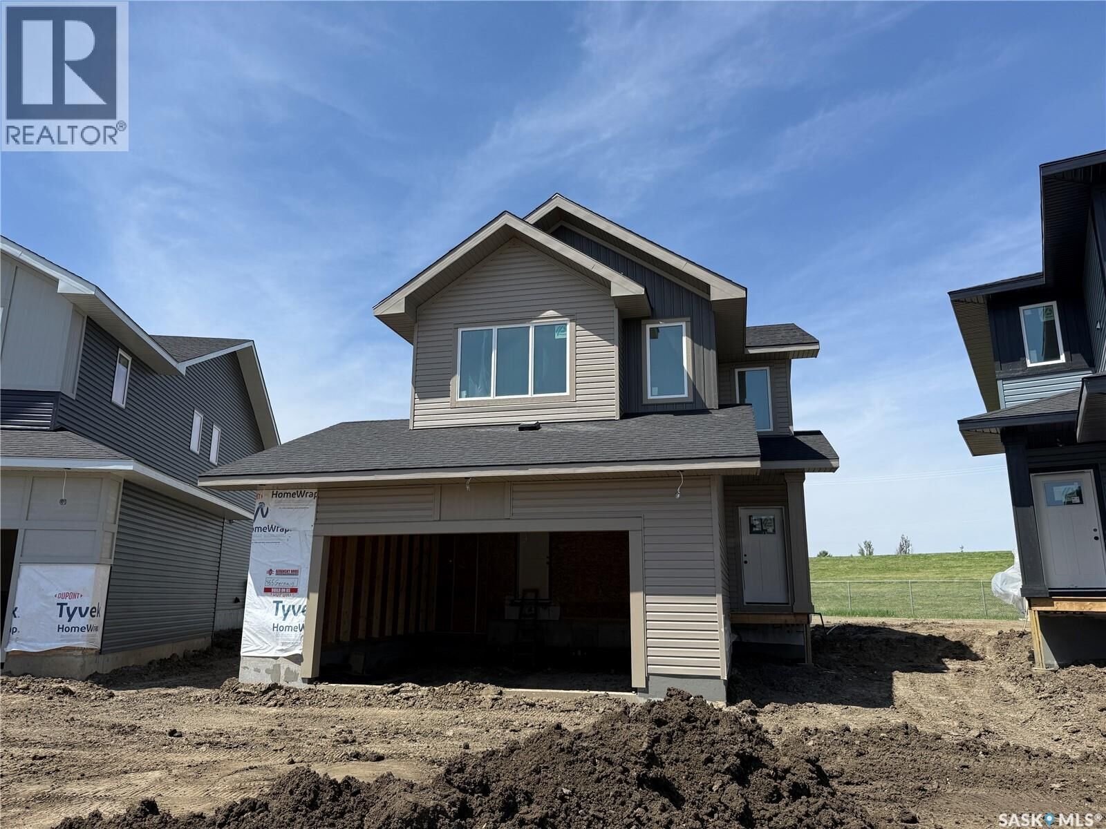 Property Photo:  465 Germain Manor  SK S7V 0T9 