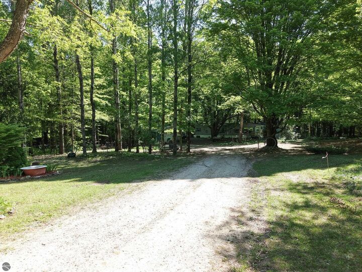 Property Photo:  13517 Viaduct Road  MI 49625 