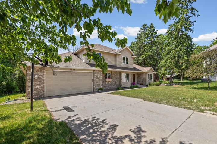 Property Photo:  5705 Lois Lane  MN 55126 