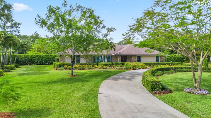Property Photo:  13175 Doubletree Circle  FL 33414 