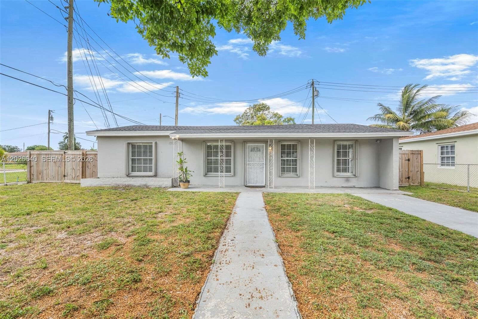 Property Photo:  1200 NW 87th St 1  FL 33147 