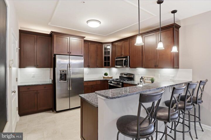 Property Photo: 24636 Woolly Mammoth Terrace 202 VA 20105