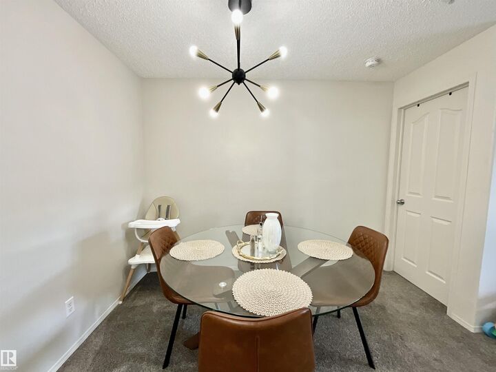 Property Photo: 16303 95 Street NW 217 AB T5Z 3V1