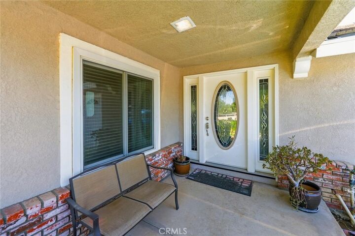 Property Photo:  23030 Miners Rd  CA 92570 