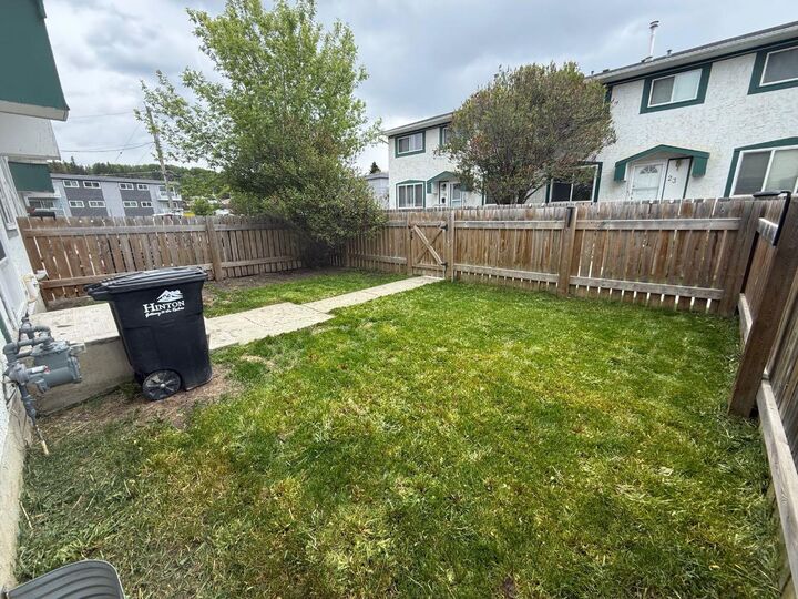 Property Photo: 110 Tamarack Avenue 26 AB T7V 1C5