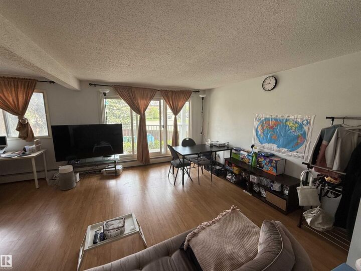Property Photo: 4404 122 Street NW 225 AB T6J 4A9