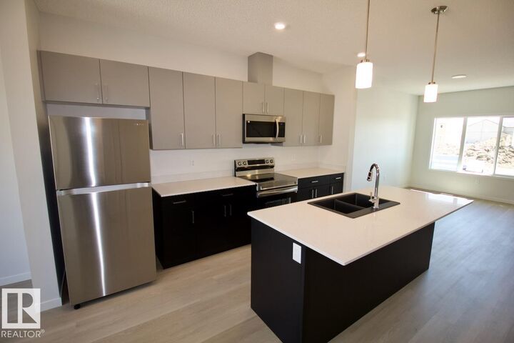 Property Photo:  9642 Colak Link SW Upper  AB T6W 5B6 
