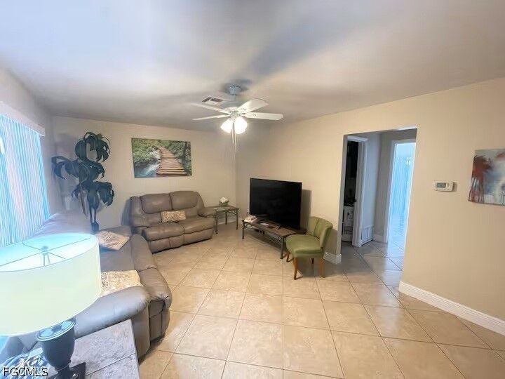 Property Photo:  712 SE 47th Street Left Side  FL 33904 