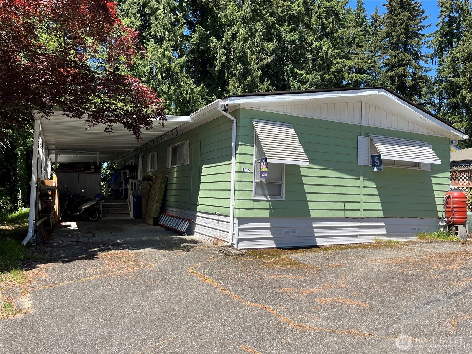 Property Photo:  3333  228th St SE 113  WA 98021 