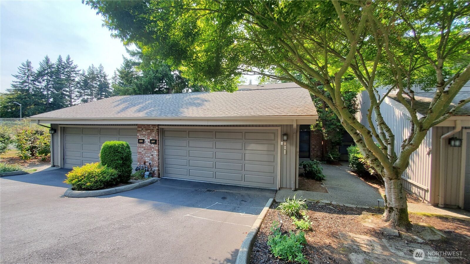 Property Photo:  137  143rd Place NE 30  WA 98007 