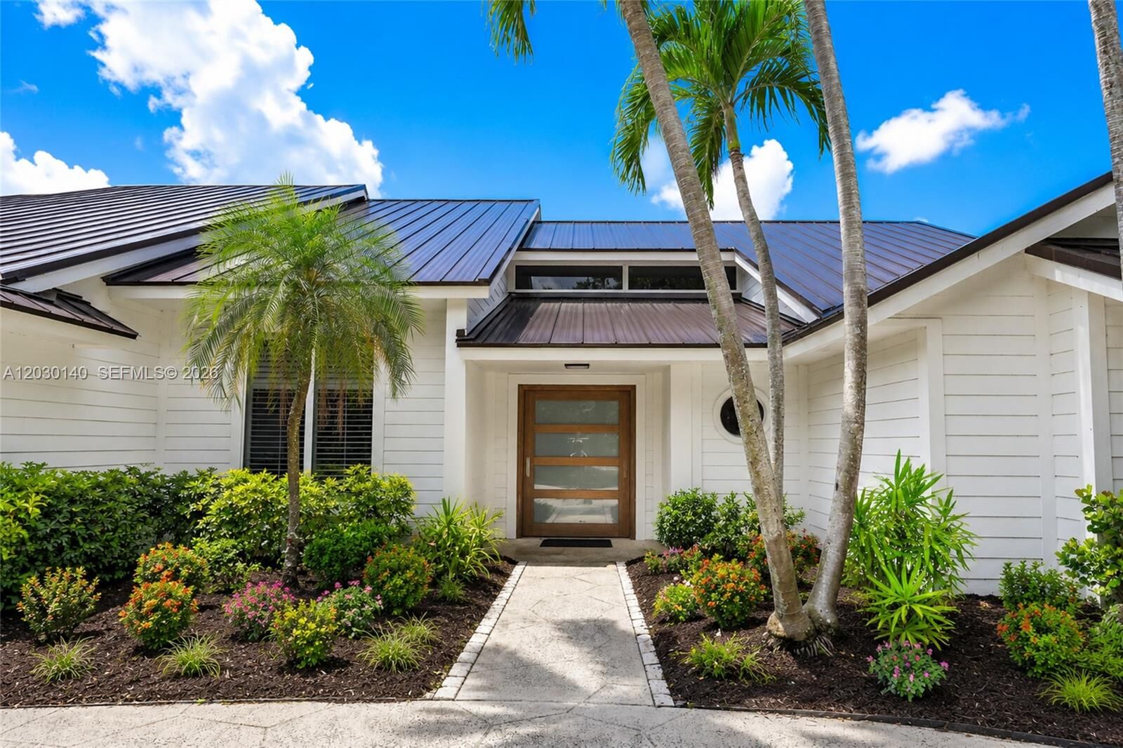 Property Photo:  10290 SE Banyan Way  FL 33469 