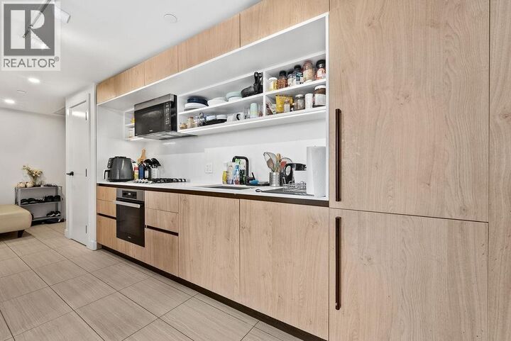 Property Photo:  5058 Joyce Street 2504  BC V5R 0J9 