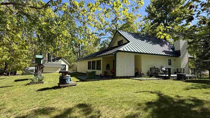 Property Photo:  7774 Sandpiper  MI 49735 