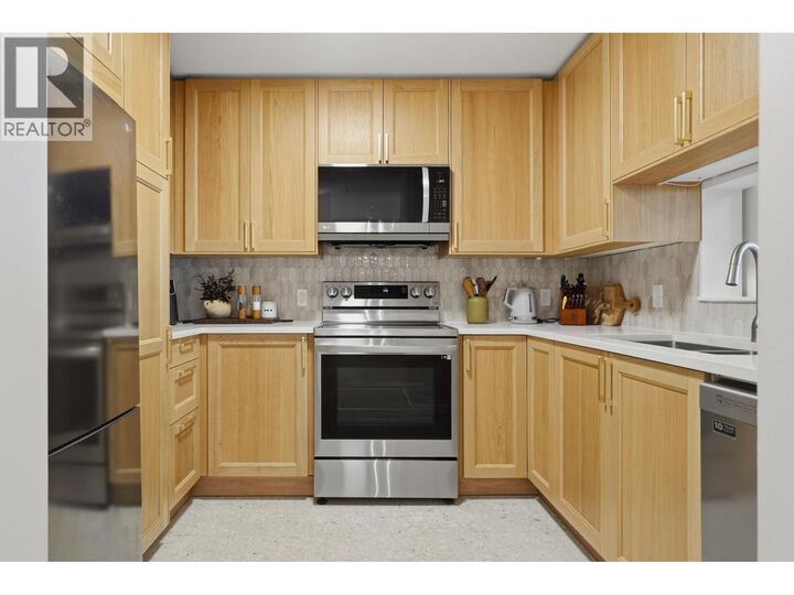 Property Photo:  221 Eleventh Street 604  BC V3M 4C8 