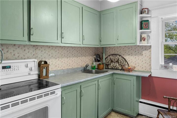 Property Photo:  1 Clement Cormier Street  NB E1A 3B6 