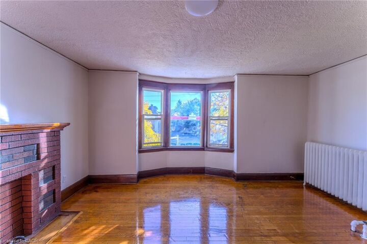 Property Photo:  1369 Main Street E 2  ON L8K 1B8 