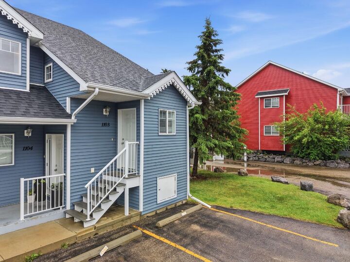 Property Photo: 5220 50A Avenue 1103 AB T4S 1E5