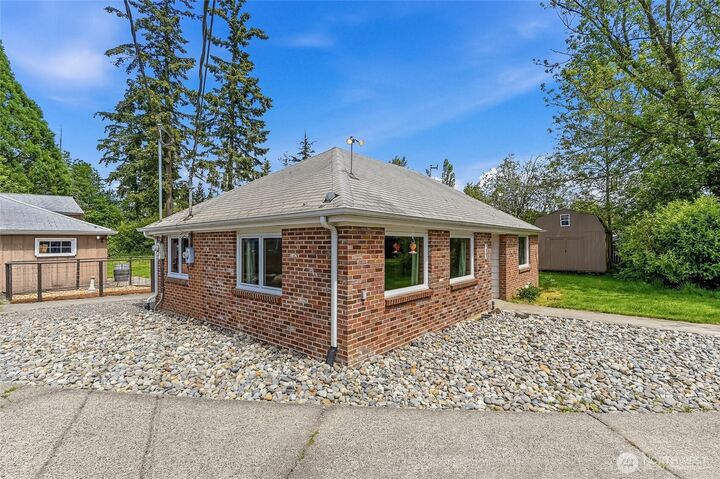Property Photo:  1805  80th Street E  WA 98404 