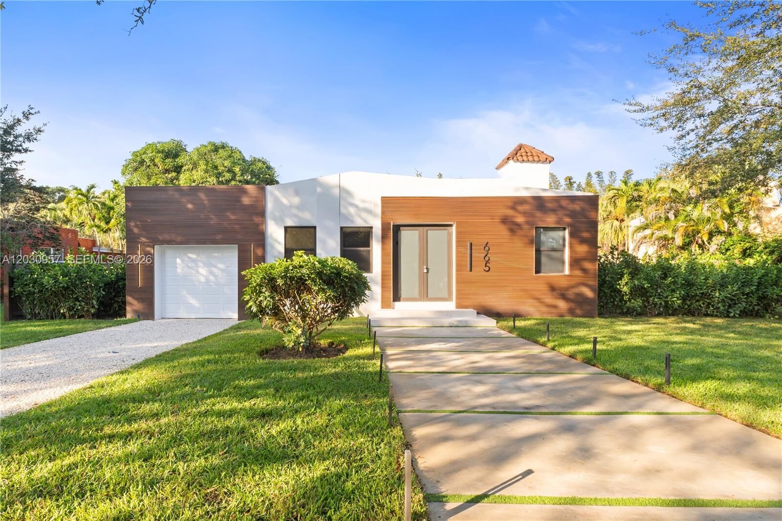 Property Photo: 665 NE 117th St FL 33161