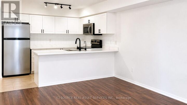 Property Photo:  2460 Post Road 4  ON L6H 0J2 