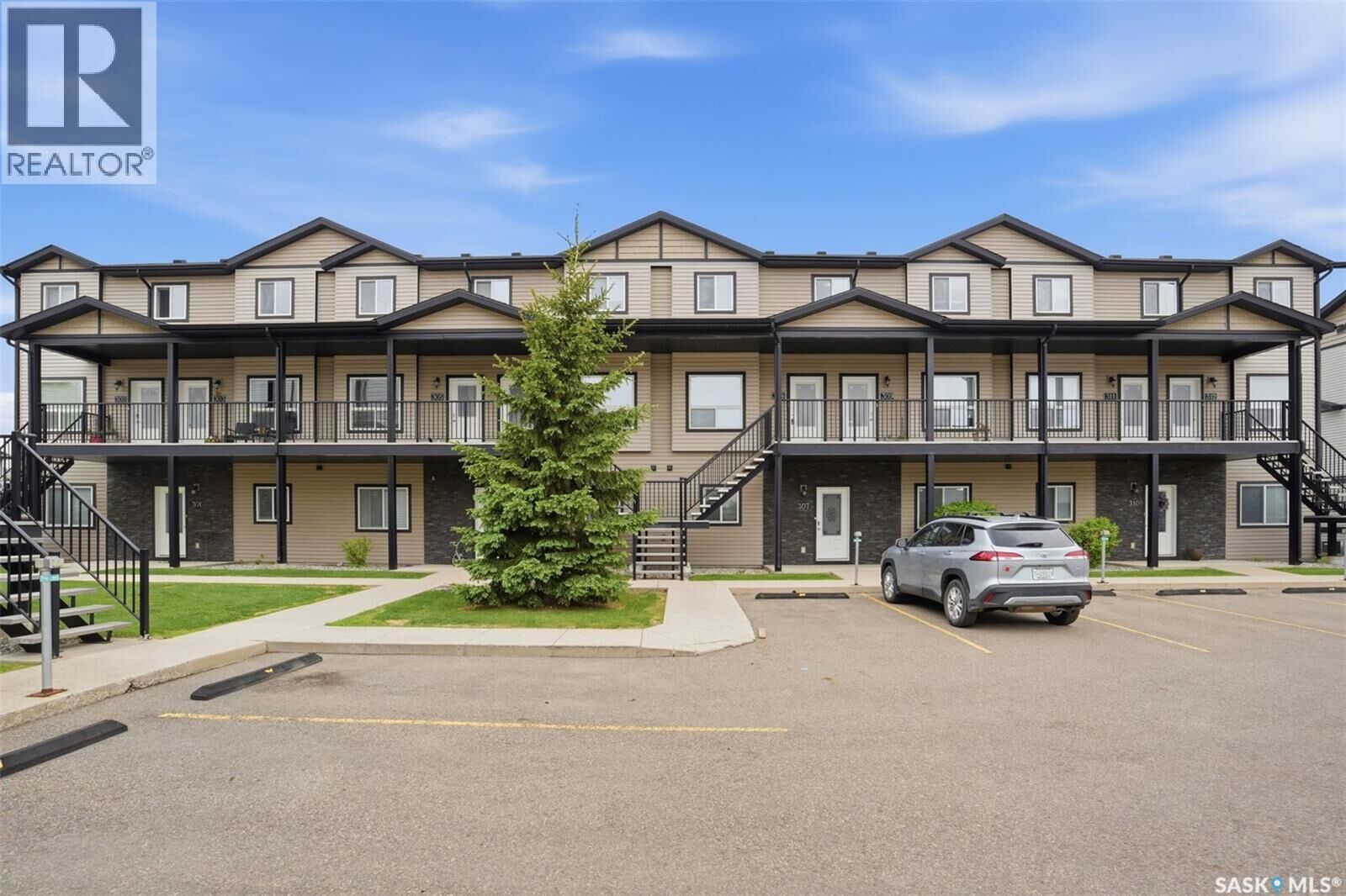 Property Photo:  305 103 Klassen Crescent  SK S7R 0J2 