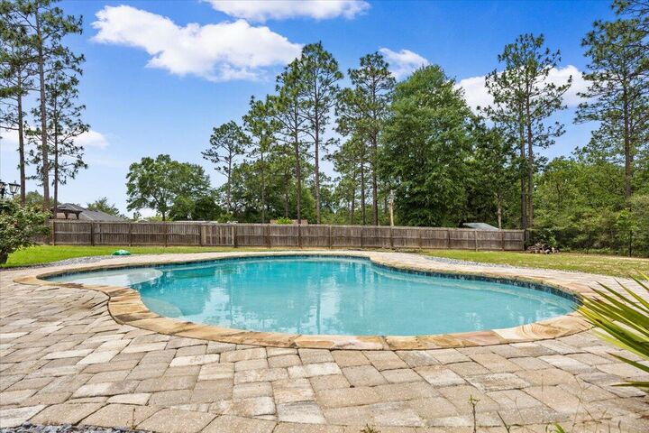 Property Photo:  6458 Welannee Boulevard  FL 32567 