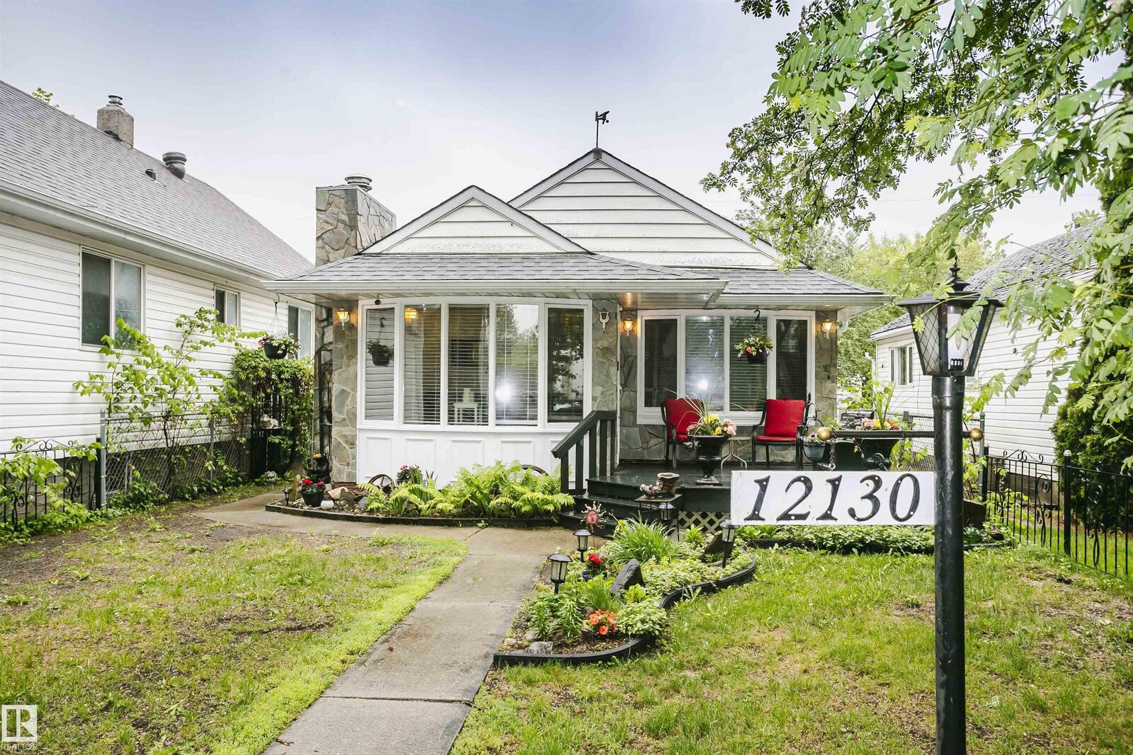 Property Photo:  12130 95 Street NW  AB T5G 1M8 